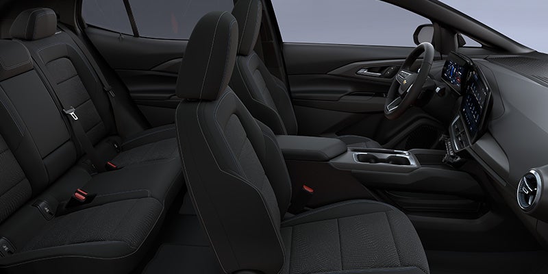 Interior of the 2026 Chevrolet Equinox EV in Northampton, MA, with premium leather-appointed seats, a flat floor maximizing legroom, and a spacious 57.2 cubic feet of cargo space for versatility.