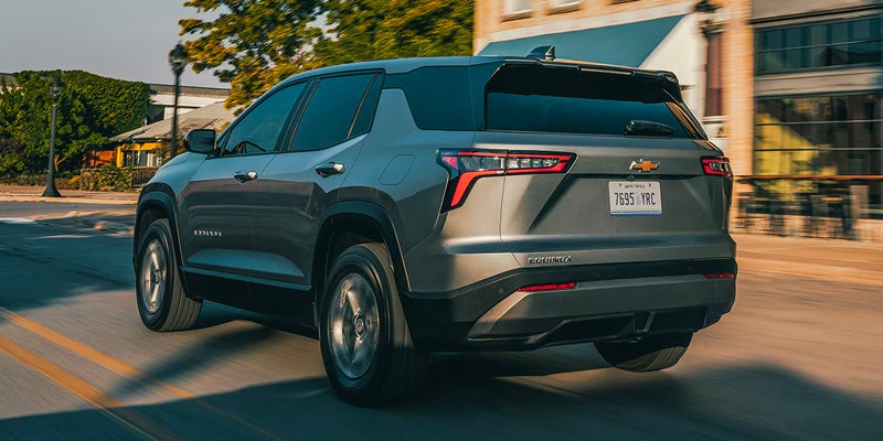 rear view of 2026 Chevrolet Equinox EV in Northampton MA showing electric SUV cargo space and modern taillight design