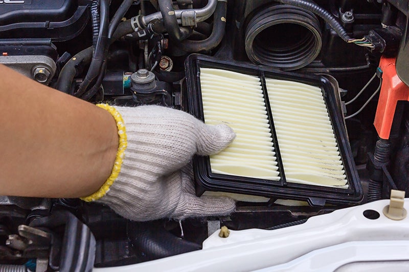 Man changing a air filter